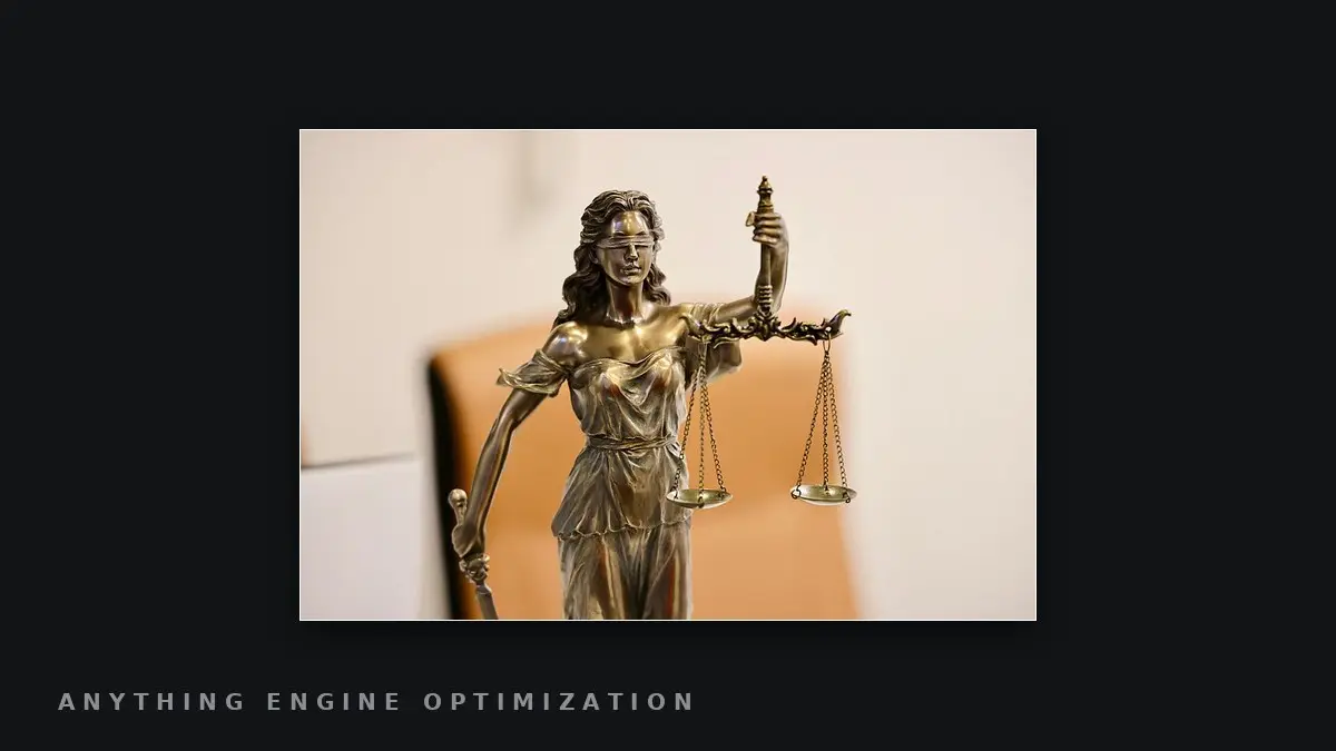 A bronze statue of Lady Justice holding up scales, framed on a dark field.